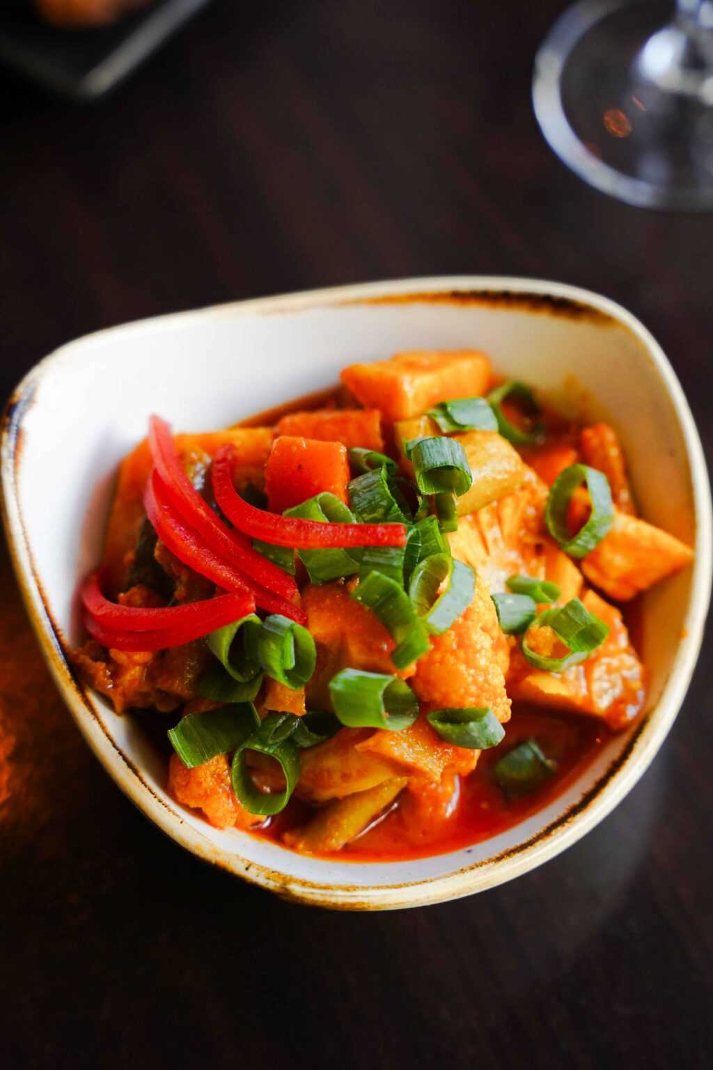 A bowl of Indian curry at Indian Mehek